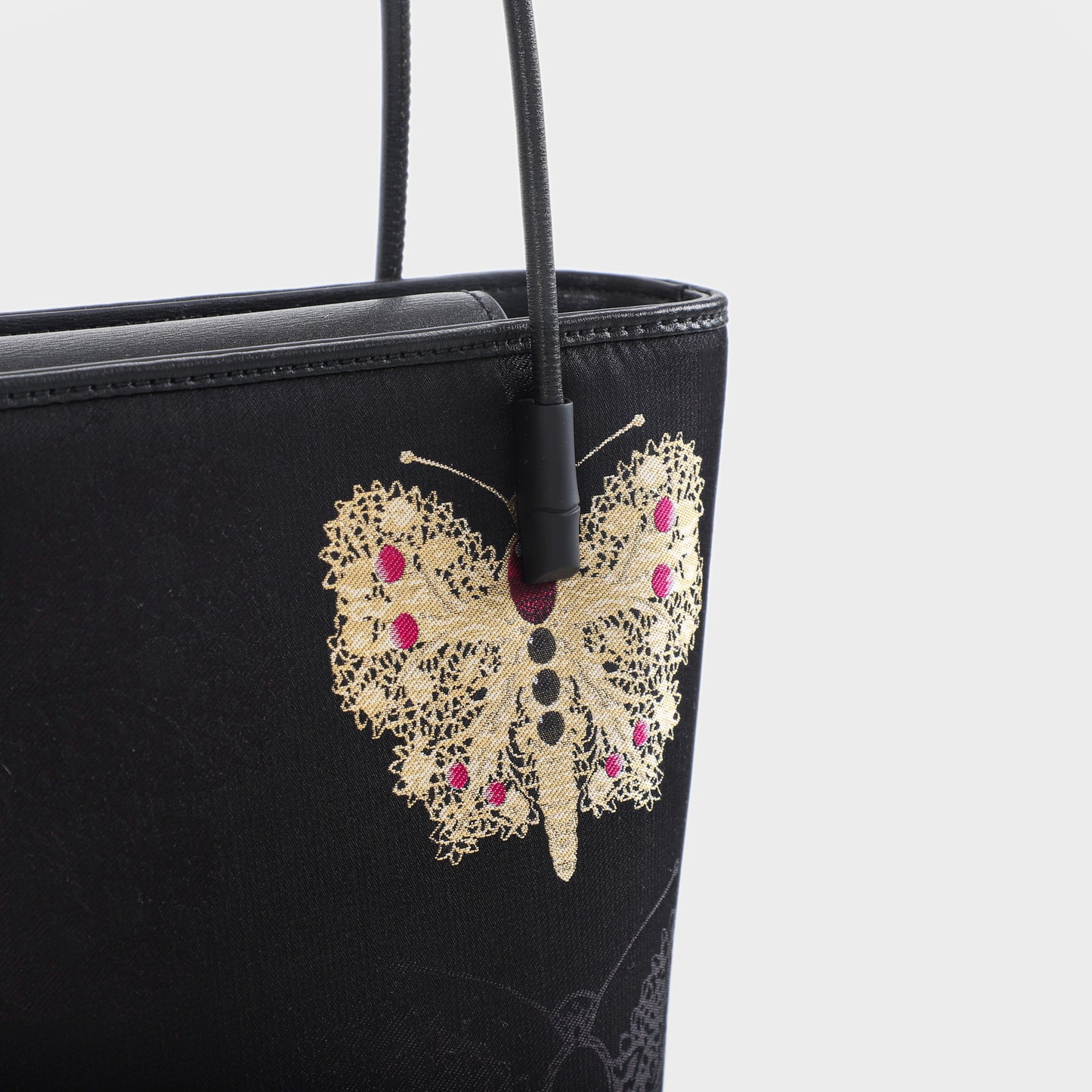 black butterfly handbag
