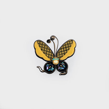 golden brooch